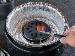 COBB 6 CobbleStones 7 COBB 6 CobbleStones -Kortingswinkel voor buitenkamperen sfeerfoto cobb pro zwart aansteken cobble stone ecommerce 3a32